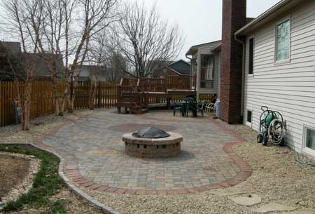 Outdoor Circular Fire Pit in Stone Surround